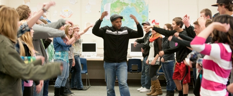 Actor Jason Sanford leads local students in a workshop.